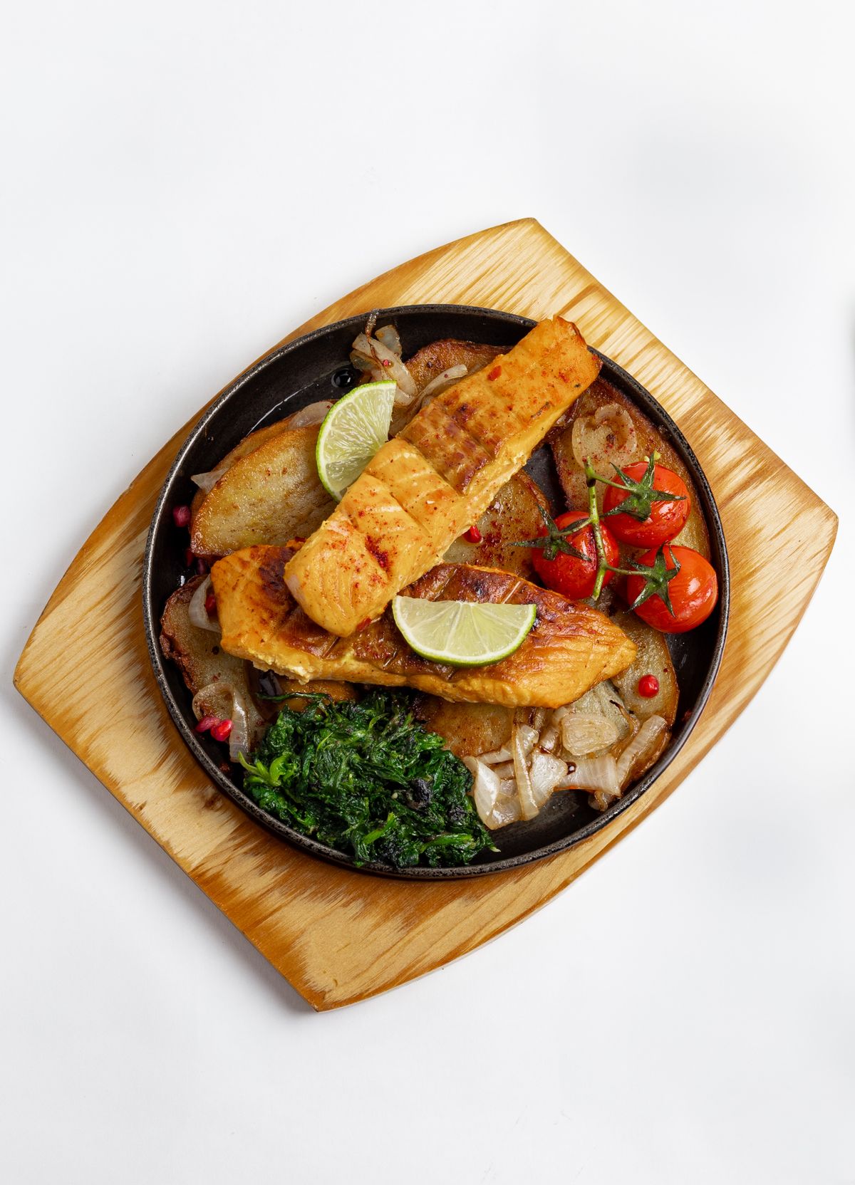 Plated grilled salmon, restaurant dish